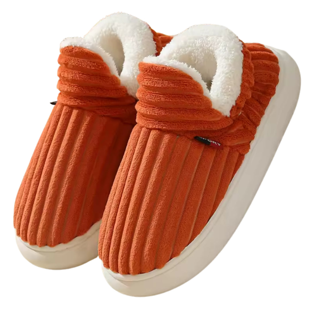 Orange Cord-Hausschuhe mit weißem Fellfutter, seitliche Ansicht